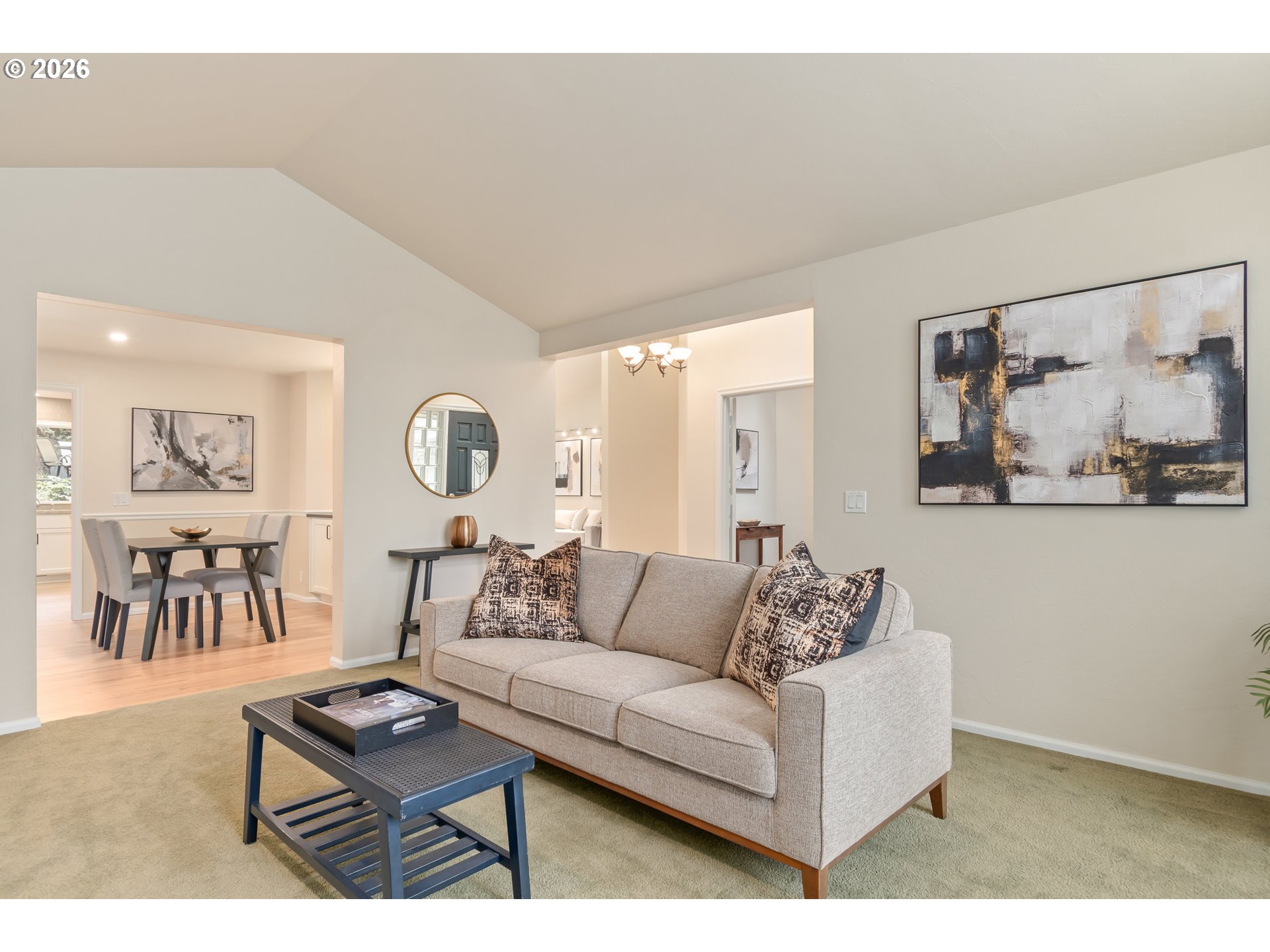 2380 West 28th Avenue Eugene, OR 97405 - Photo 6 of 48 a living room with furniture and paintings on the wall