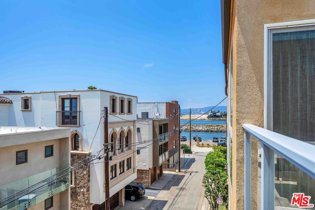 15 63rd Avenue, Unit 3 Playa del Rey, CA 90293 - Photo 18 of 34 a view of buildings from the balcony