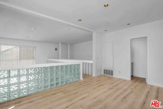 a close view of a sink and cabinets in the kitchen