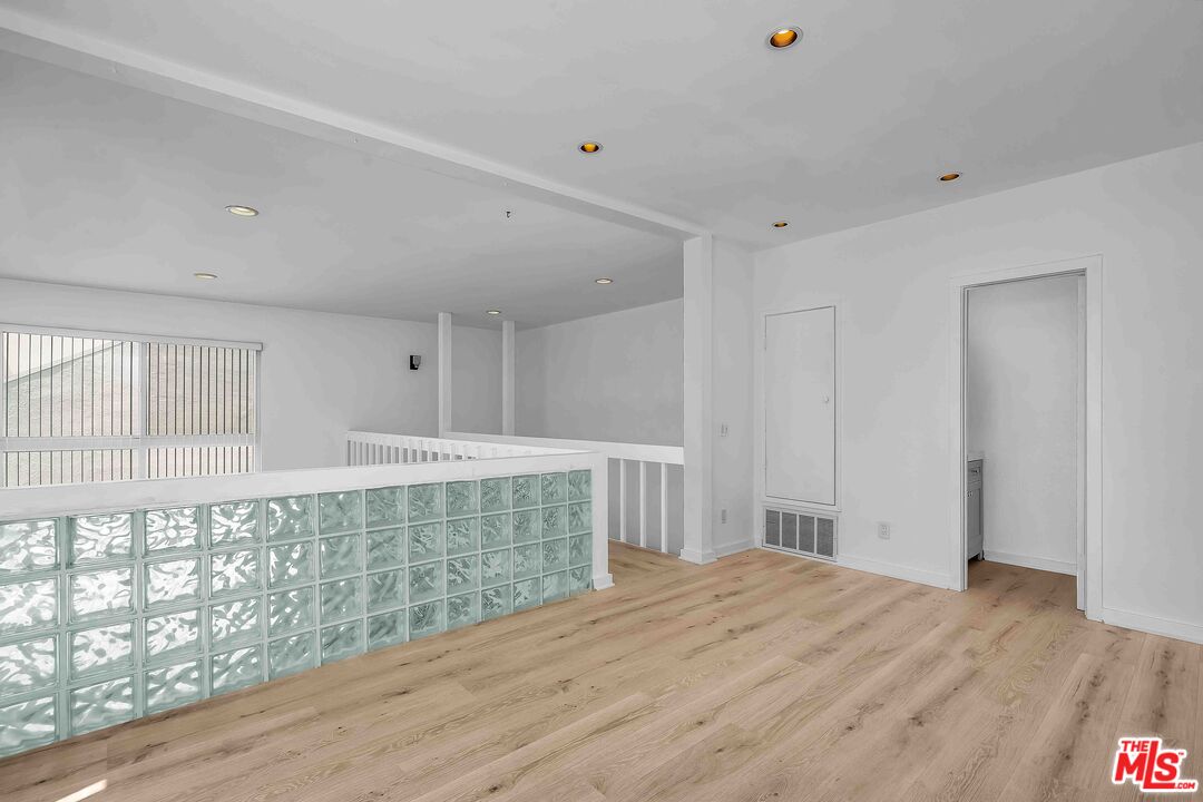 15 63rd Avenue, Unit 3 Playa del Rey, CA 90293 - Photo 20 of 34 a view of empty room with wooden floor