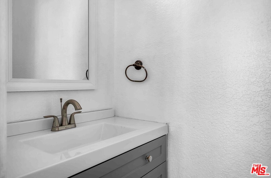 15 63rd Avenue, Unit 3 Playa del Rey, CA 90293 - Photo 21 of 34 a close view of a sink and cabinets in the kitchen