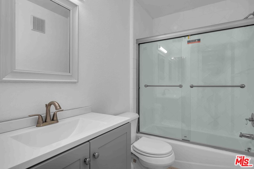 15 63rd Avenue, Unit 3 Playa del Rey, CA 90293 - Photo 26 of 34 a bathroom with a sink a toilet and shower