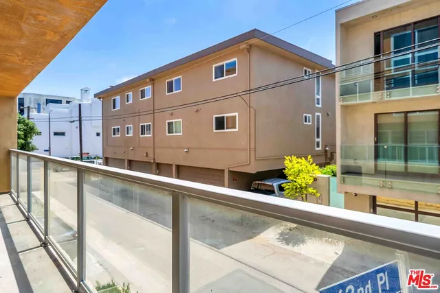 a view of a dry yard with wooden floor