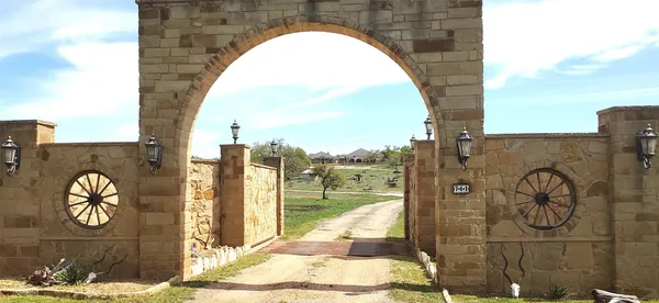 a view of a garden with a fountain