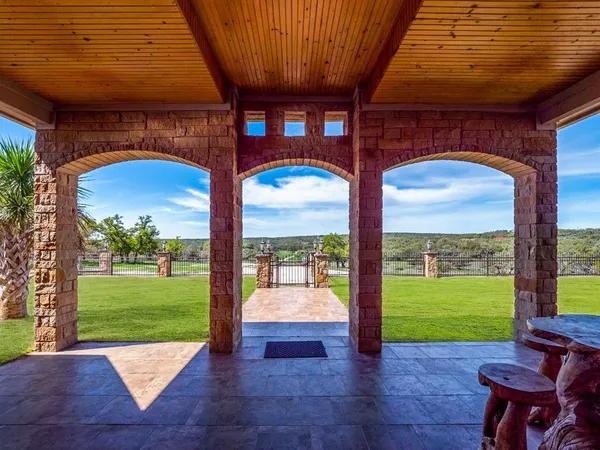a view of yard with an outdoor space and seating