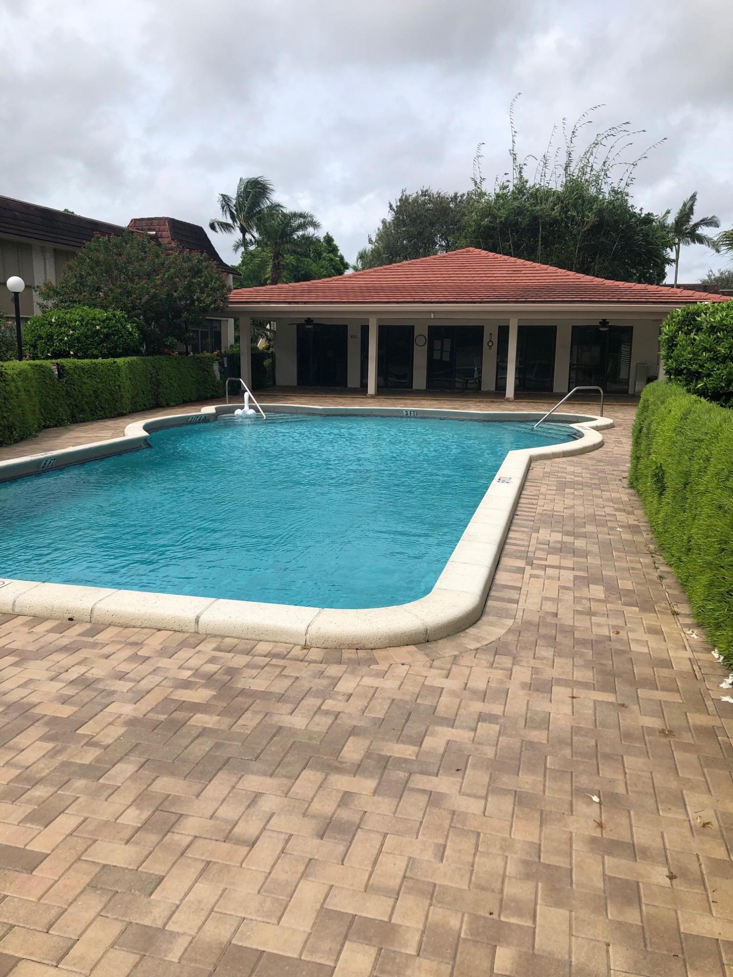 1050 Northwest 13th Street, Unit 291D Boca Raton, FL 33486 - Photo 2 of 11 Clubhouse & Pool