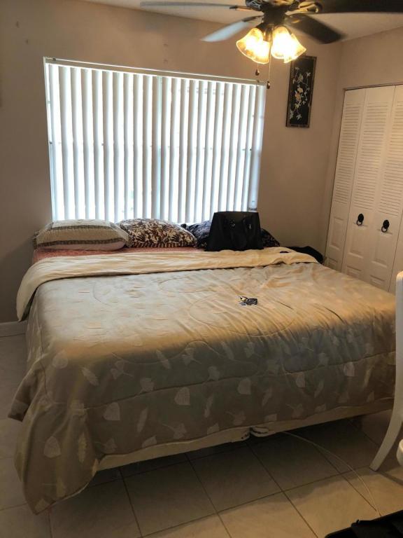 1050 Northwest 13th Street, Unit 291D Boca Raton, FL 33486 - Photo 6 of 11 Second Bedroom