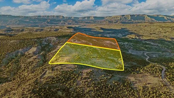 a view of a swimming pool with an ocean view