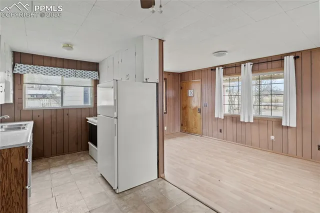 a view of a storage & utility room with a window