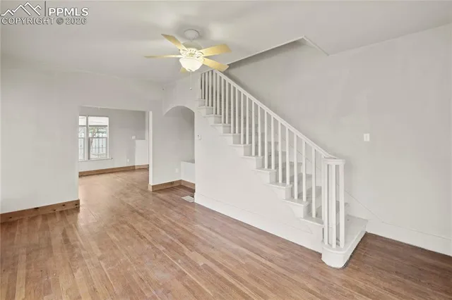 a view of entryway with wooden floor