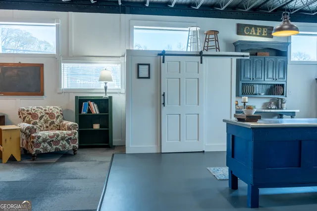 a bathroom with a shower and a window