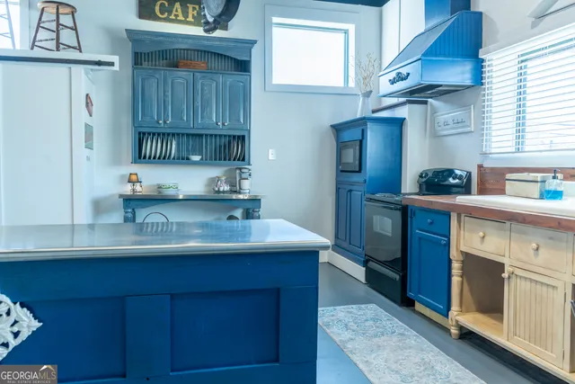 a view of a bathroom from a hallway