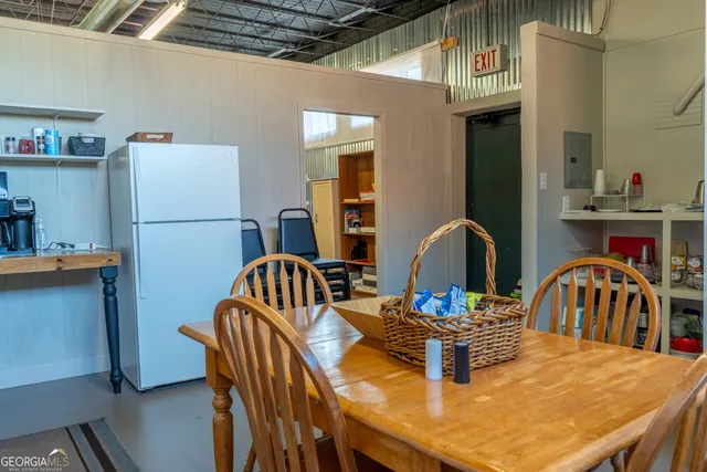 a view of a house with a street