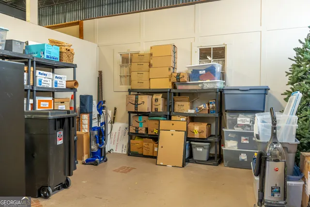 a bench sitting in front of a door