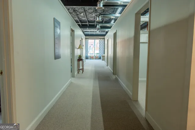 an aerial view of a city with streets and houses