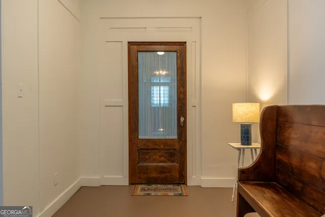 an aerial view of residential houses with street