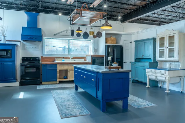 a bedroom with a bed and a table