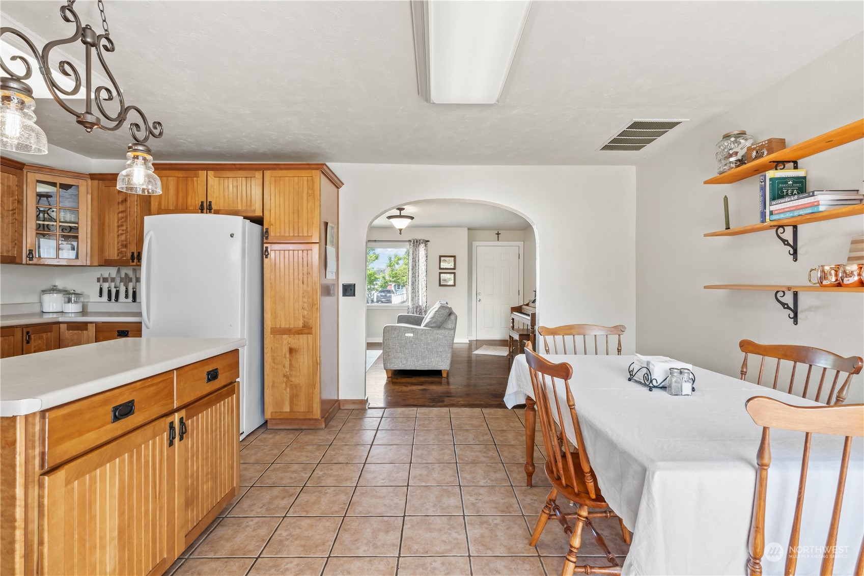 1616 Maple Street Sumner, WA 98390 - Photo 13 of 40 a kitchen with a sink appliances and cabinets