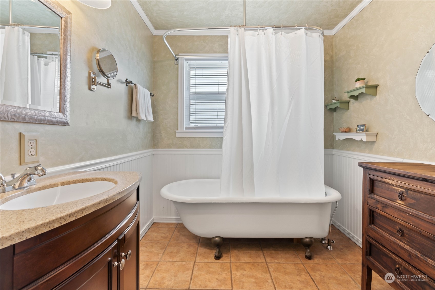 1616 Maple Street Sumner, WA 98390 - Photo 14 of 40 a bathroom with a bathtub sink and toilet