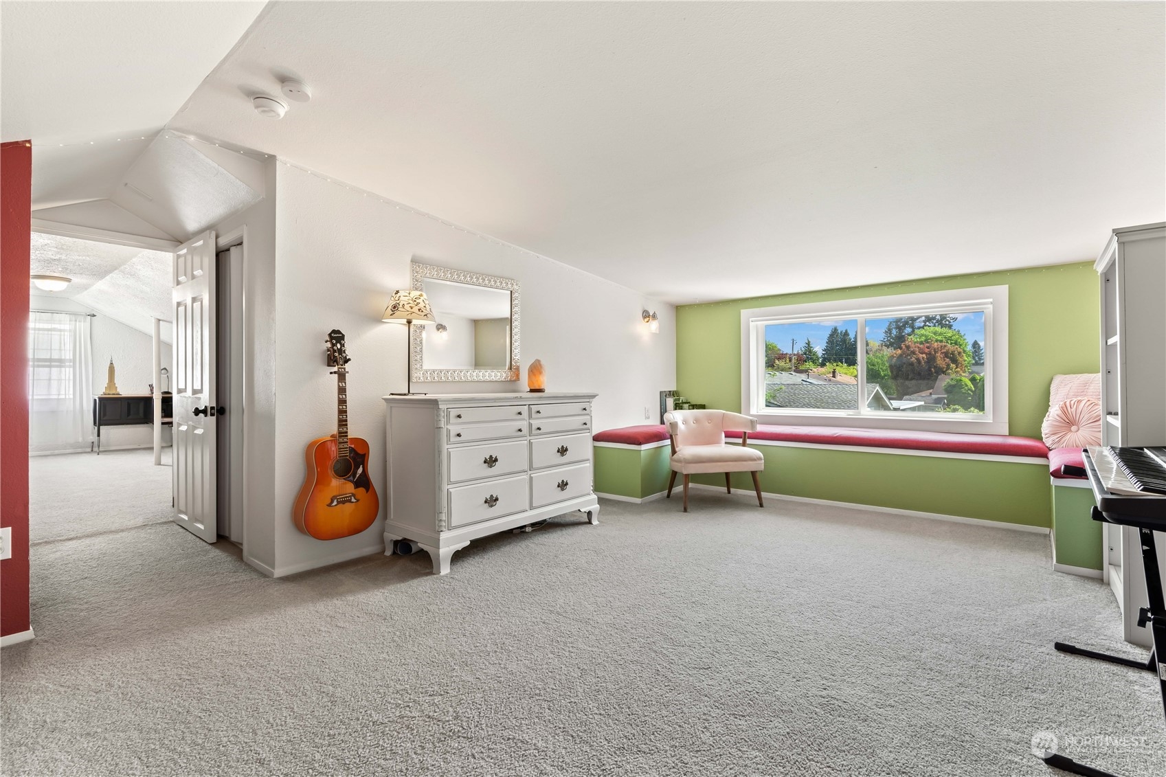 1616 Maple Street Sumner, WA 98390 - Photo 18 of 40 a bedroom with furniture and a window