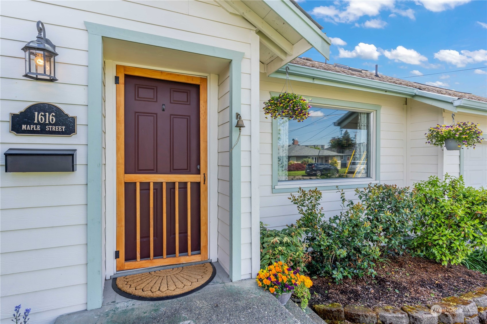 1616 Maple Street Sumner, WA 98390 - Photo 2 of 40 a view of a entryway door front of house