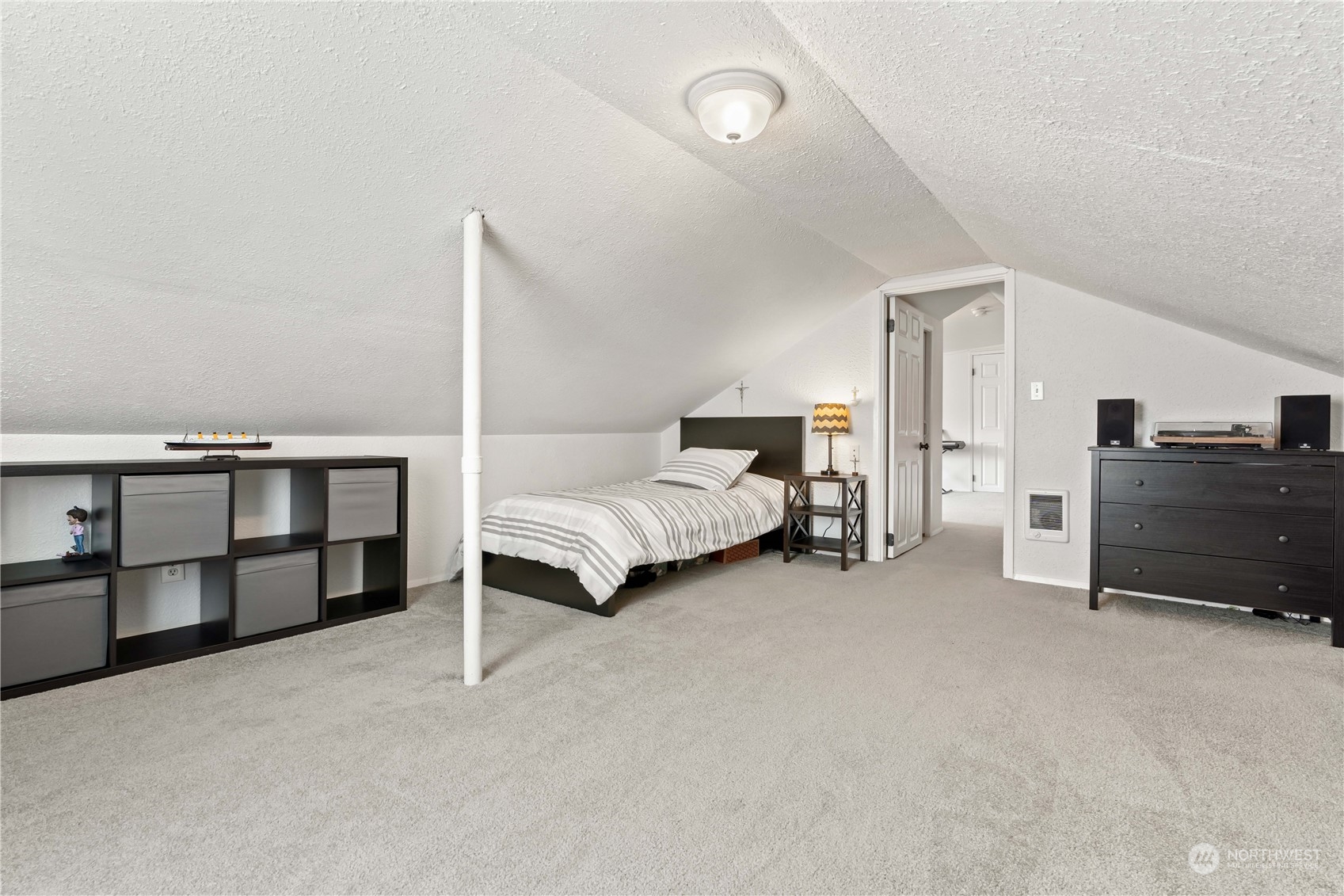 1616 Maple Street Sumner, WA 98390 - Photo 21 of 40 a bed room with a bed and furniture