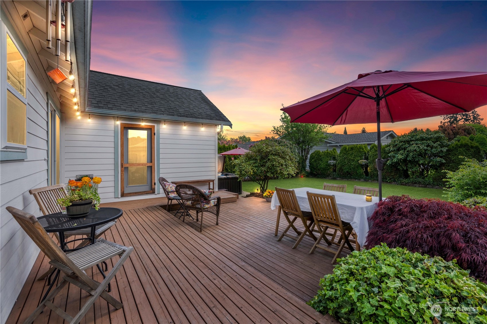 1616 Maple Street Sumner, WA 98390 - Photo 27 of 40 a view of a backyard with sitting area