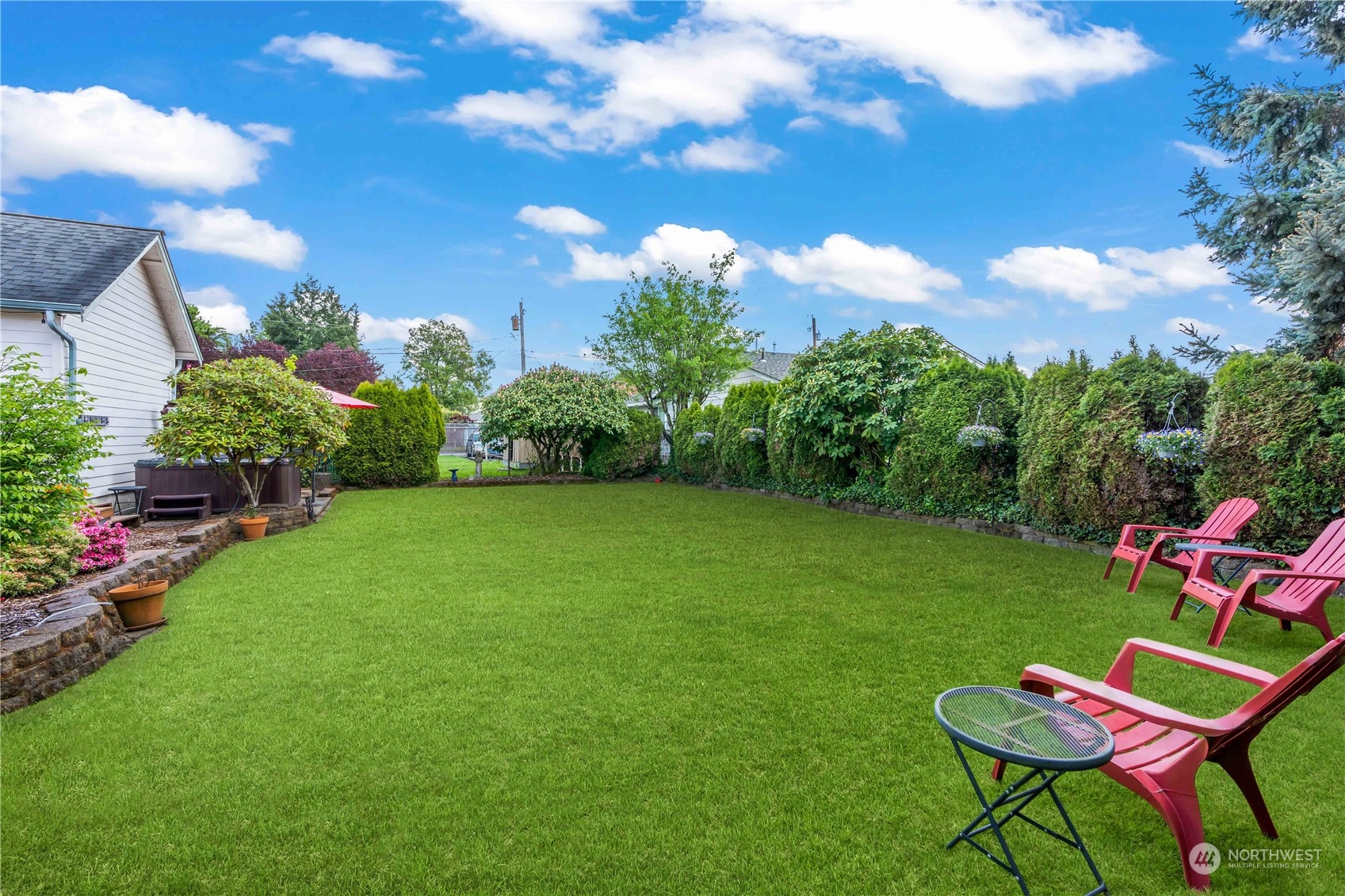 1616 Maple Street Sumner, WA 98390 - Photo 29 of 40 a view of a chairs and table in the garden