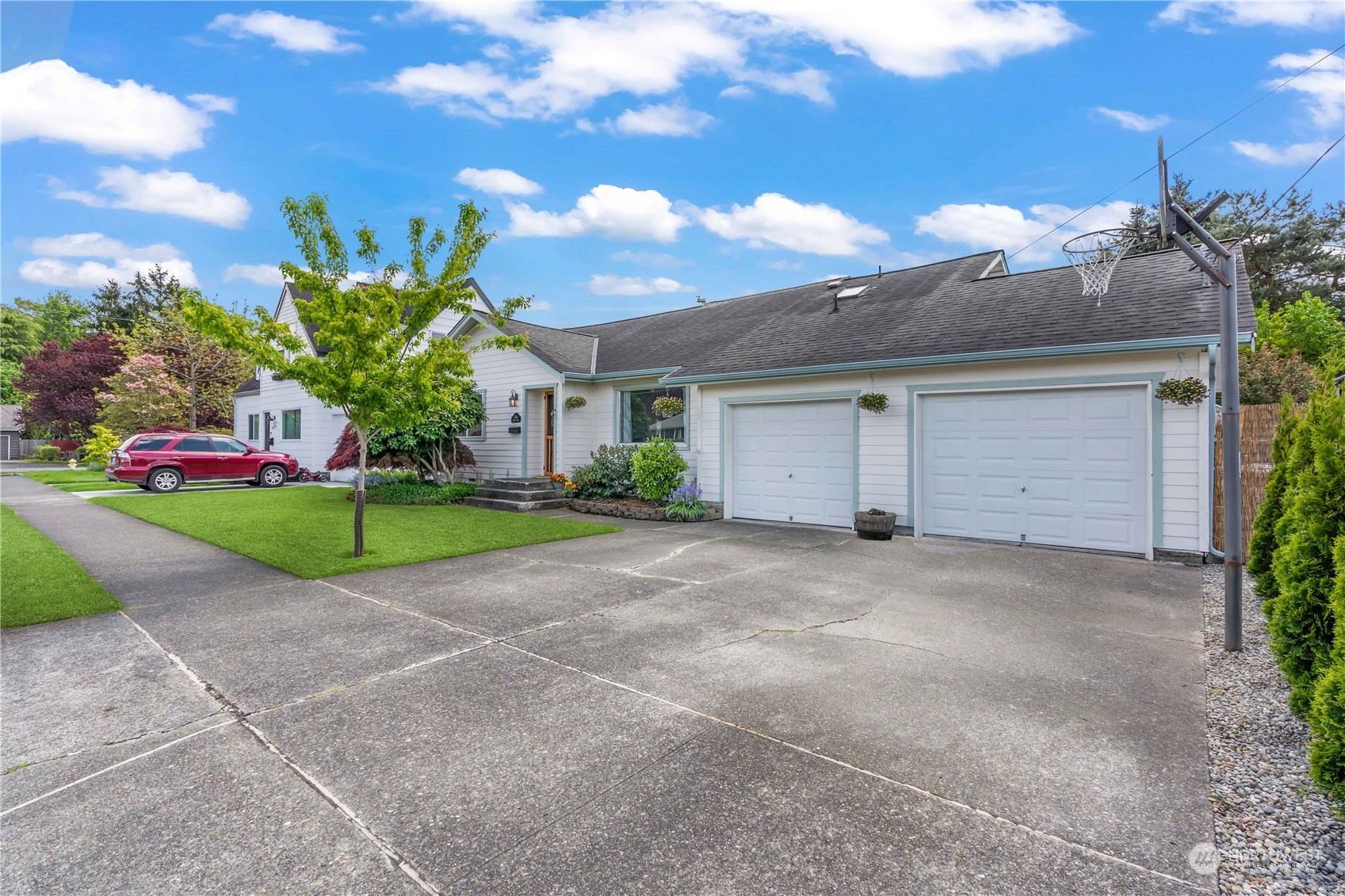 1616 Maple Street Sumner, WA 98390 - Photo 40 of 40 a view of a house with a yard and large tree