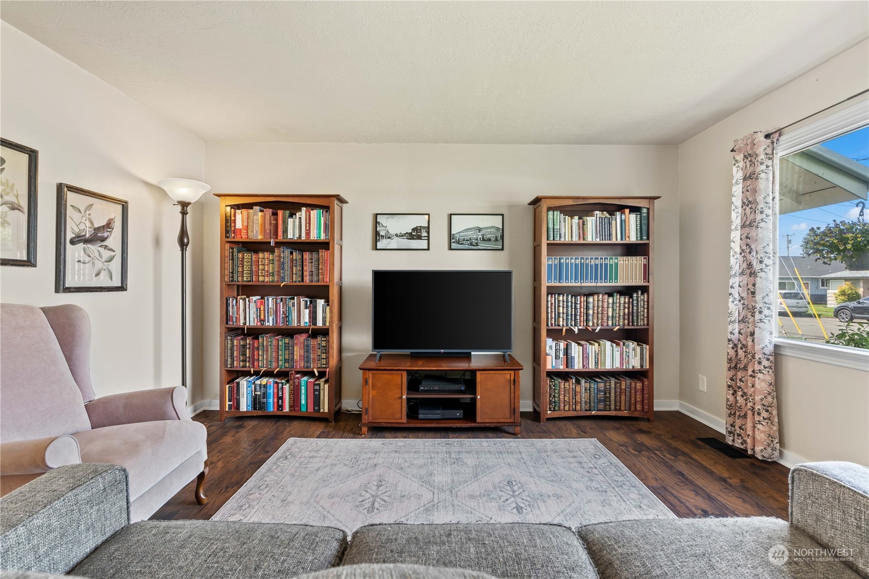 1616 Maple Street Sumner, WA 98390 - Photo 4 of 40 a living room with furniture and a flat screen tv