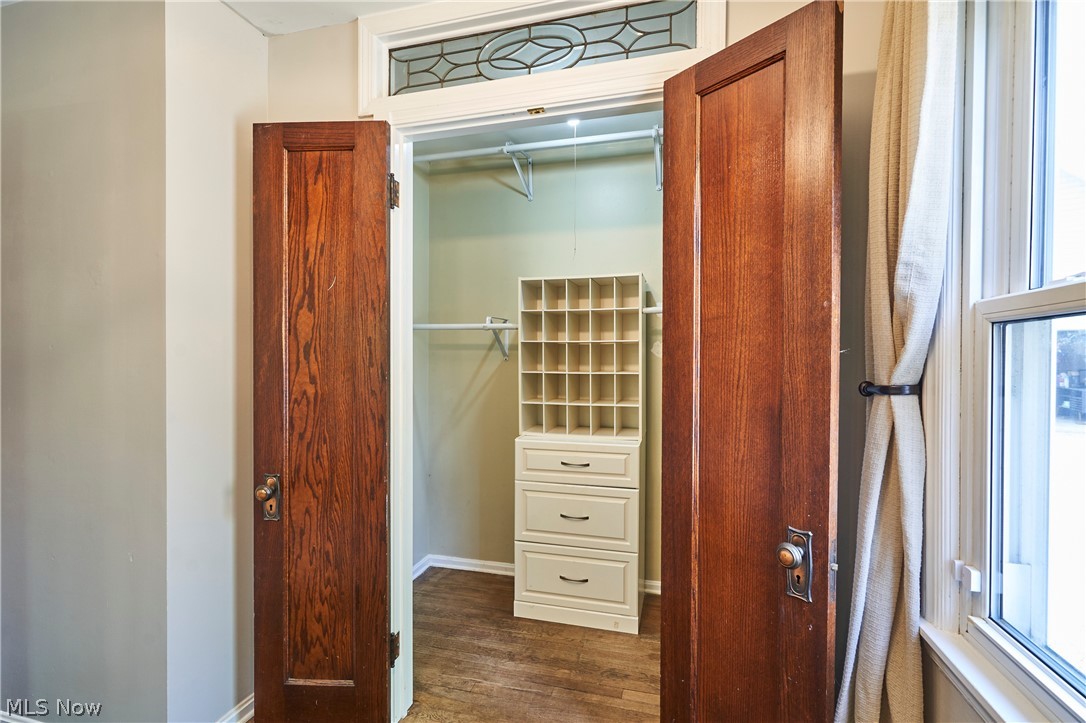 780 Bates Road Rocky River, OH 44116 - Photo 18 of 35 Interior closet featuring wood-finish flooring, built-in storage shelving, and integrated drawers