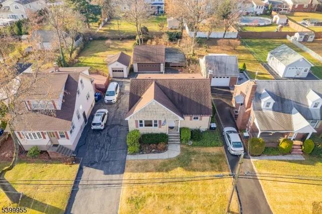 a aerial view of a house with a swimming pool