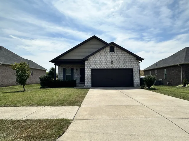 a front view of house with yard