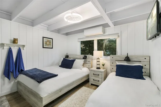 a bathroom with a shower toilet and sink