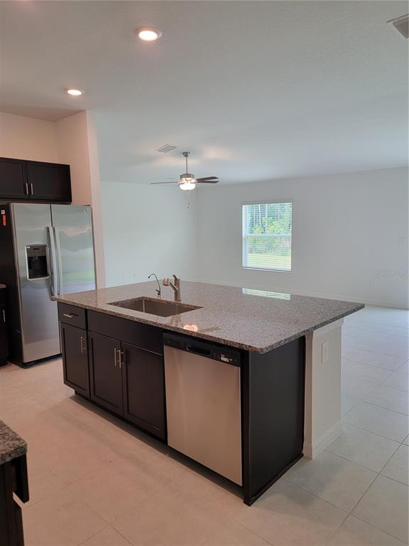1844 Red Loop Lakeland, FL 33801 - Photo 5 of 24 a kitchen with a sink and cabinets