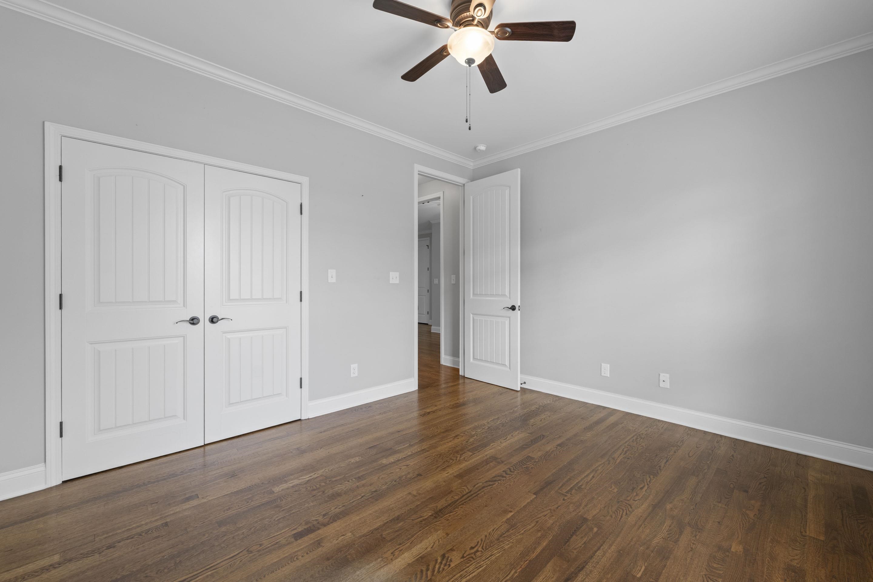 389 South Tarren Mill Circle Collierville, TN 38017 - Photo 24 of 32 a view of an empty room and wooden floor