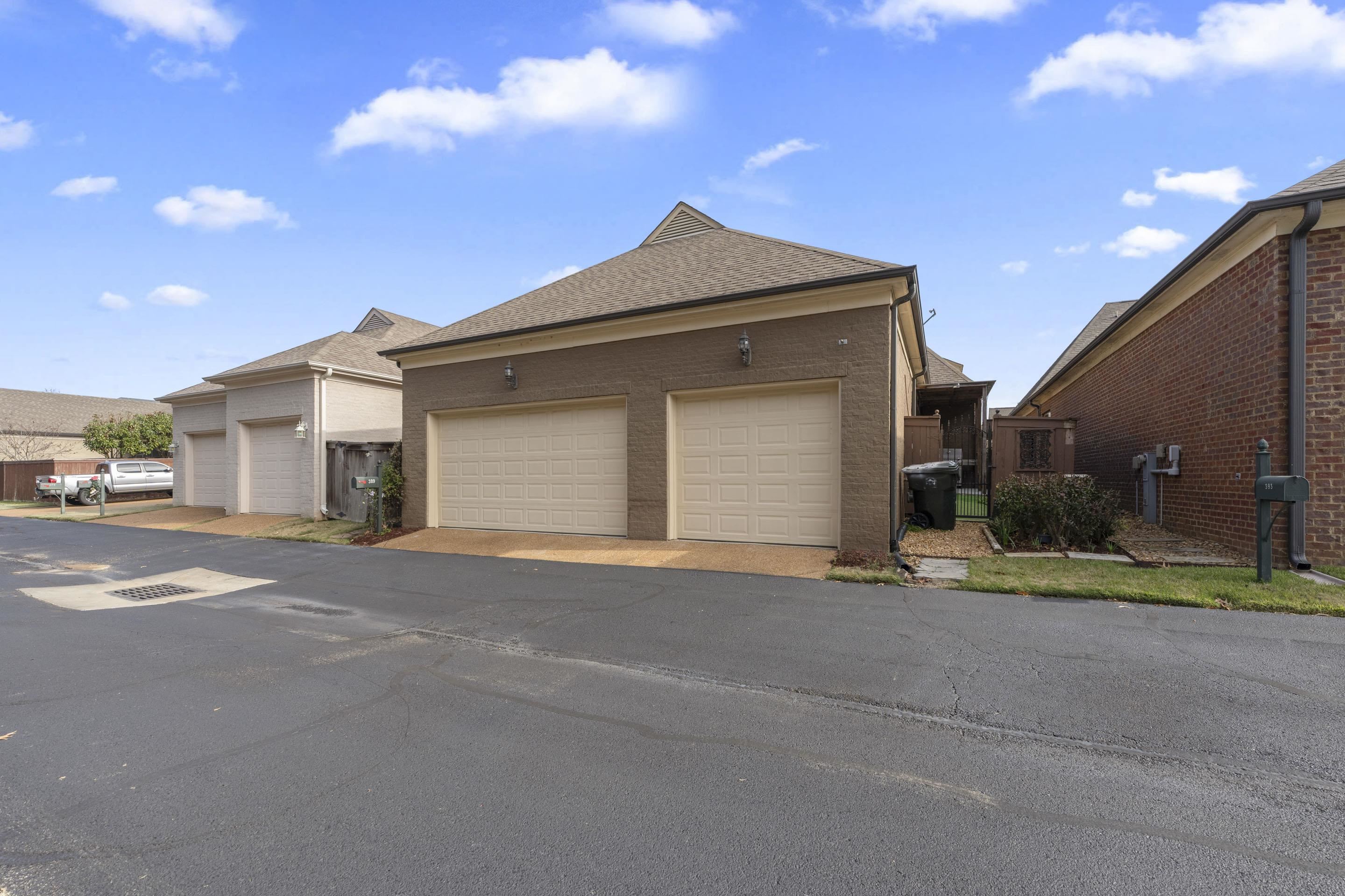 389 South Tarren Mill Circle Collierville, TN 38017 - Photo 29 of 32 a view of a house with a yard and garage