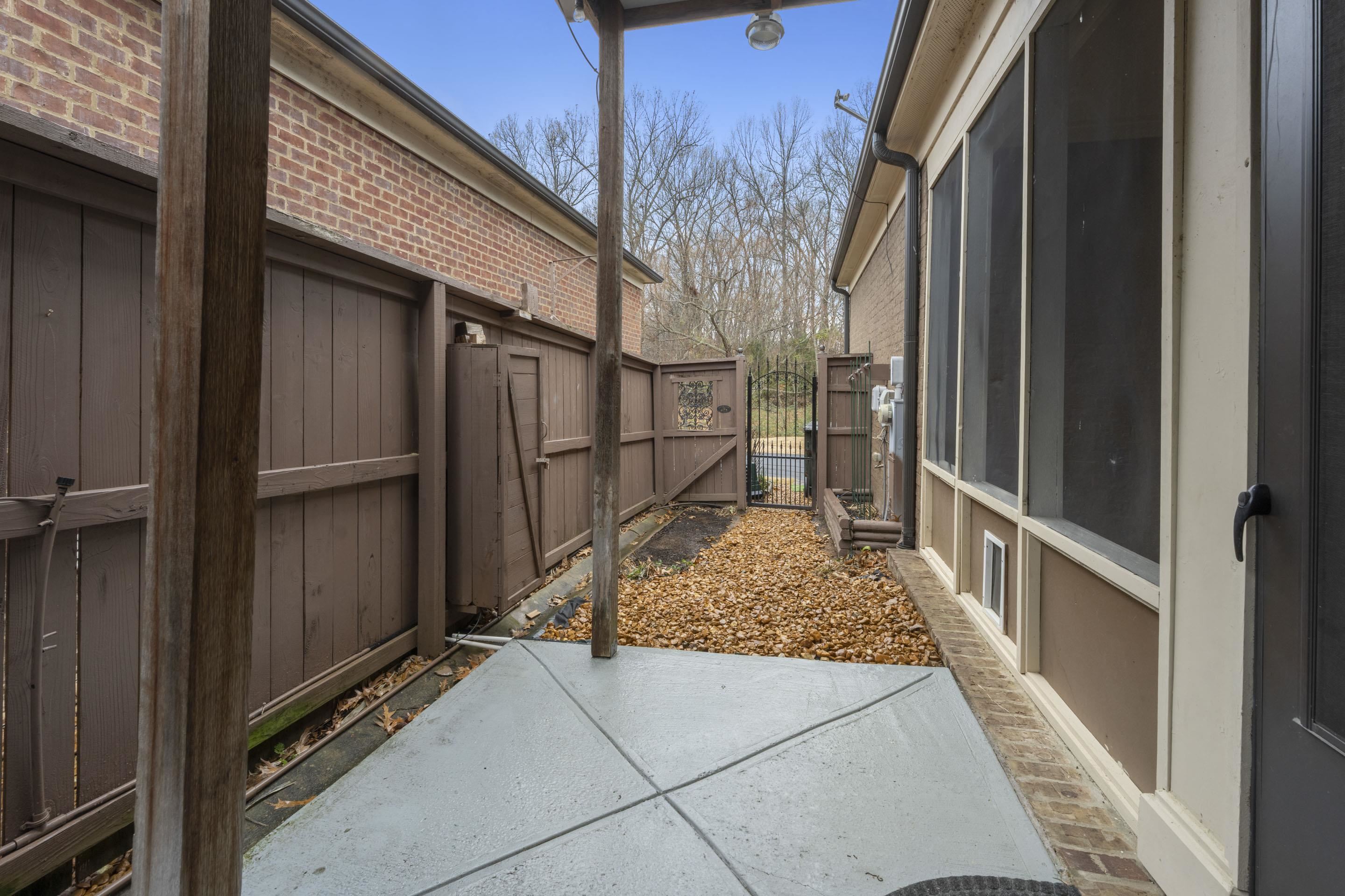 389 South Tarren Mill Circle Collierville, TN 38017 - Photo 32 of 32 a view of backyard from wooden door