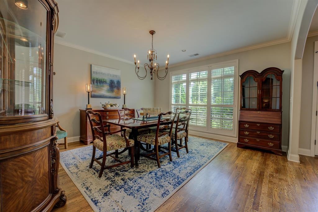 389 South Tarren Mill Circle Collierville, TN 38017 - Photo 6 of 32 a view of a dining room with furniture and wooden floor