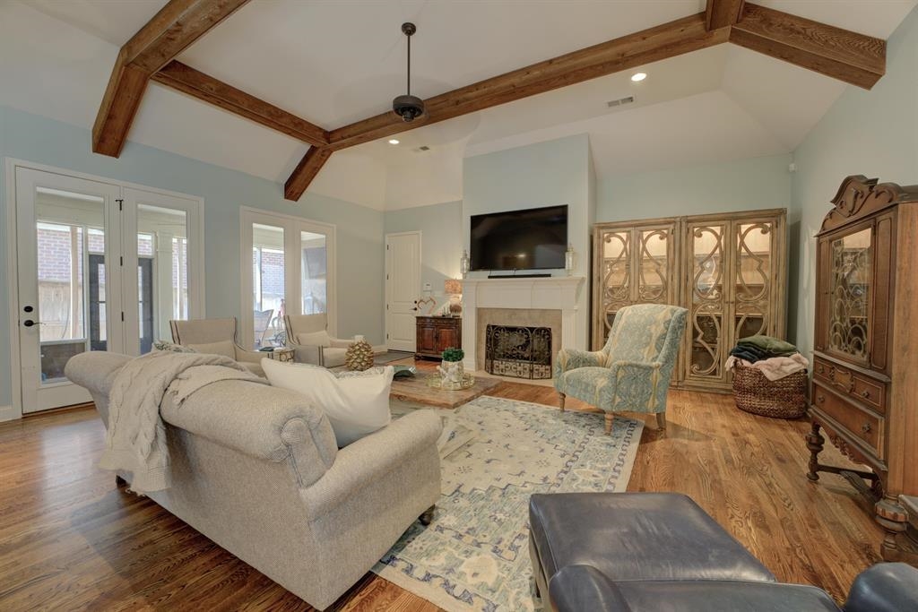 389 South Tarren Mill Circle Collierville, TN 38017 - Photo 10 of 32 a living room with furniture a fireplace and a flat screen tv