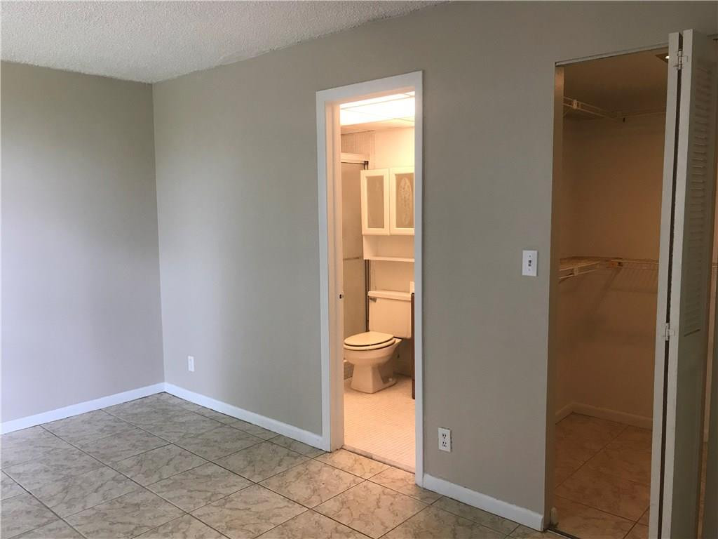 7750 West McNab Road, Unit 104 Fort Lauderdale, FL 33321 - Photo 5 of 16 MASTER BEDROOM