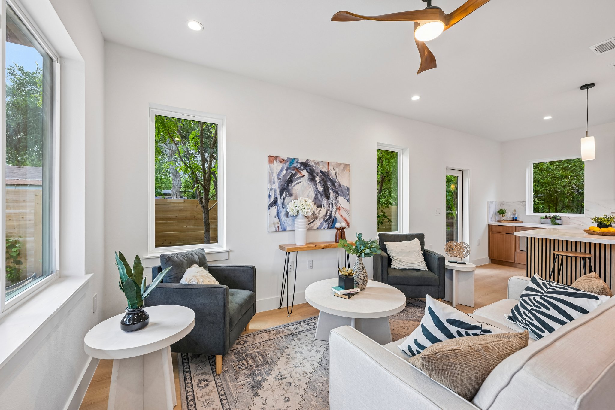 513 West Odell Street, Unit B Austin, TX 78752 - Photo 7 of 38 Natural light pours into this living space, highlighting clean lines.