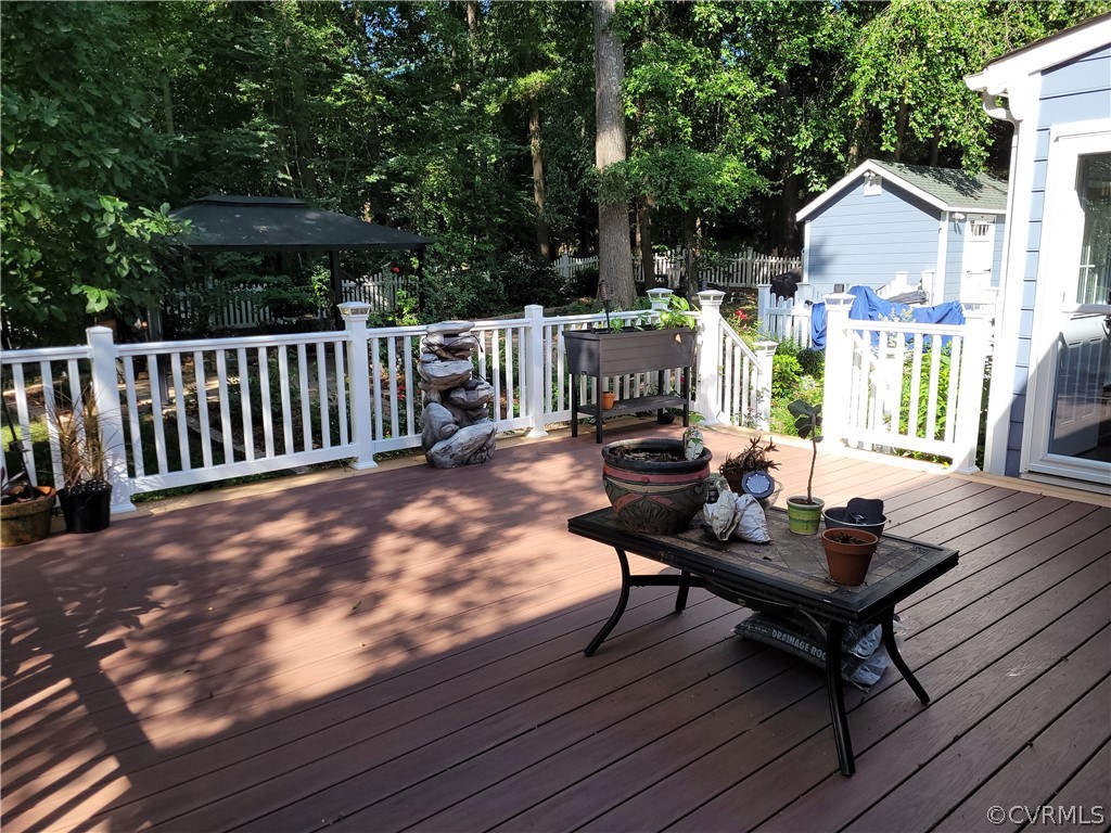 13803 Sunrise Bluff Road Midlothian, VA 23112 - Photo 23 of 42 a view of a chairs on the deck