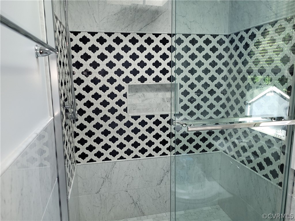 13803 Sunrise Bluff Road Midlothian, VA 23112 - Photo 30 of 42 a bathroom with a black white checkered floor