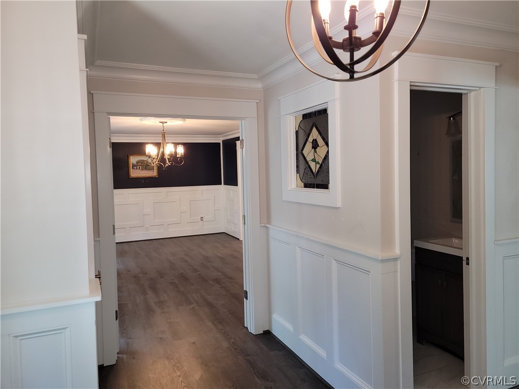 13803 Sunrise Bluff Road Midlothian, VA 23112 - Photo 4 of 42 a view of a hallway with wooden floor and a windows