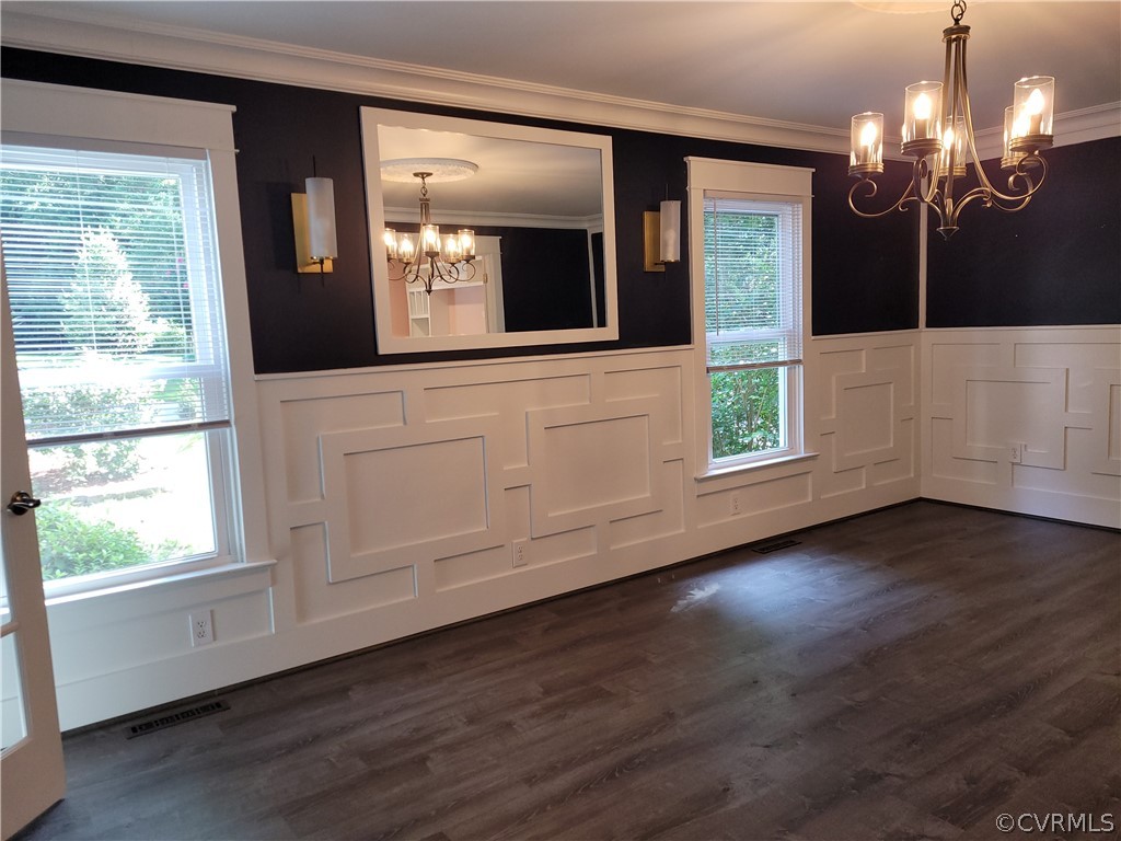 13803 Sunrise Bluff Road Midlothian, VA 23112 - Photo 6 of 42 a view of a lobby with wooden floor and mirror