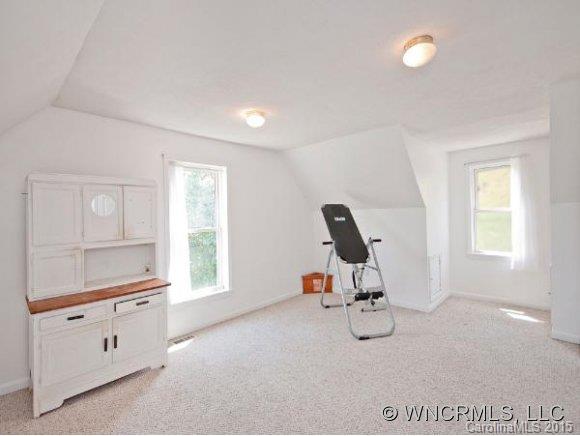378 Yates Cove Road Waynesville, NC 28785 - Photo 12 of 17 a view of a room with gym equipment
