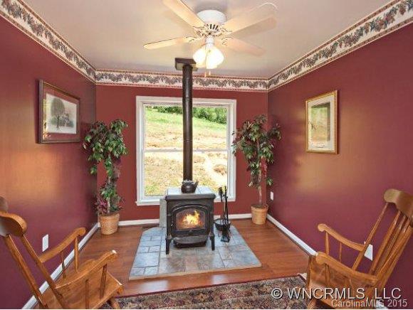 378 Yates Cove Road Waynesville, NC 28785 - Photo 6 of 17 a living room with furniture and a large window