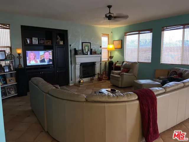 a kitchen with a sink cabinets and window