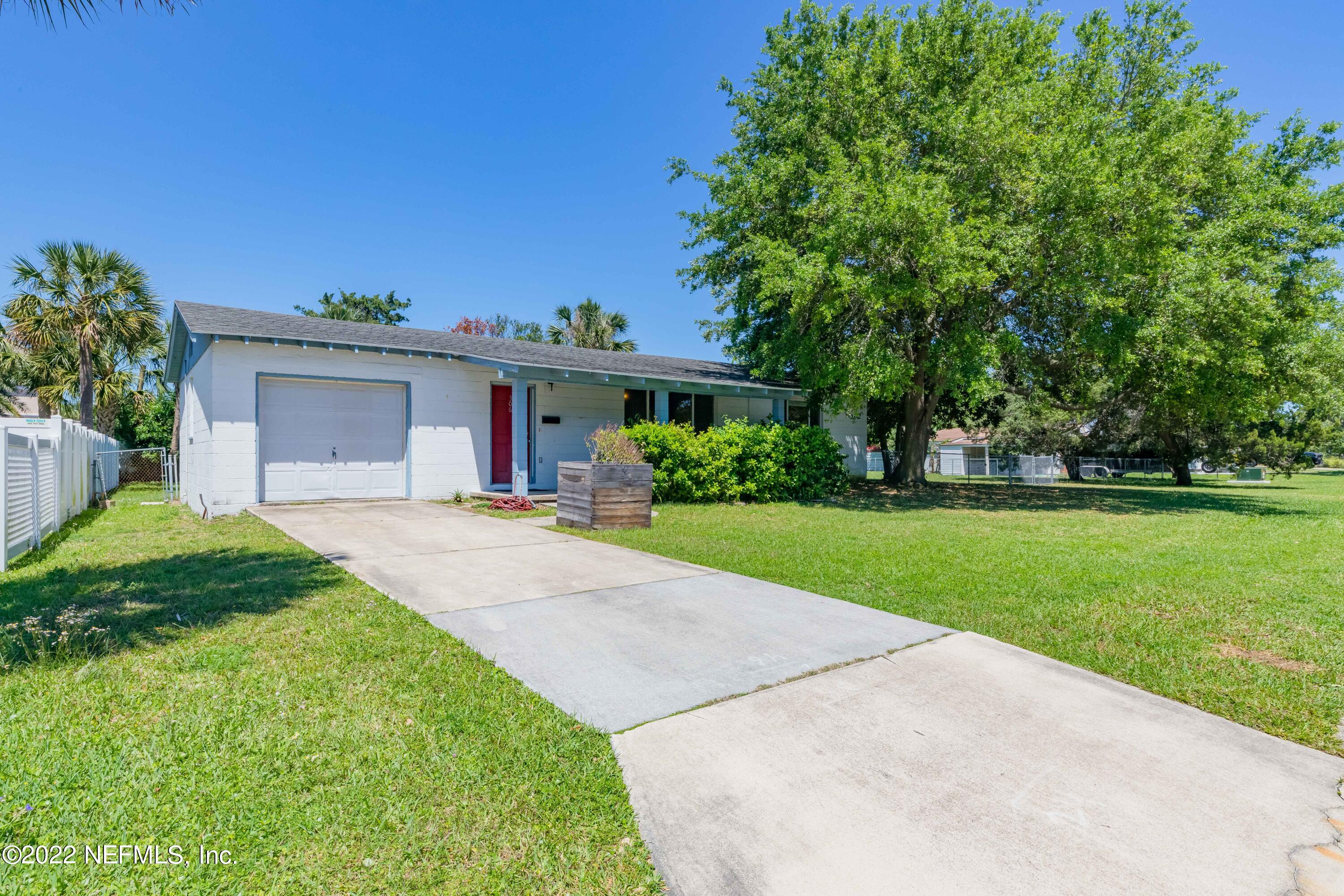 306 Ribault Street St. Augustine, FL 32080 - Photo 2 of 31 a front view of house with yard and green space